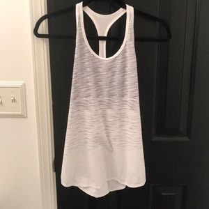Small white athletic fit Reebok tank top. New.